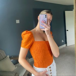 express collection orange top!